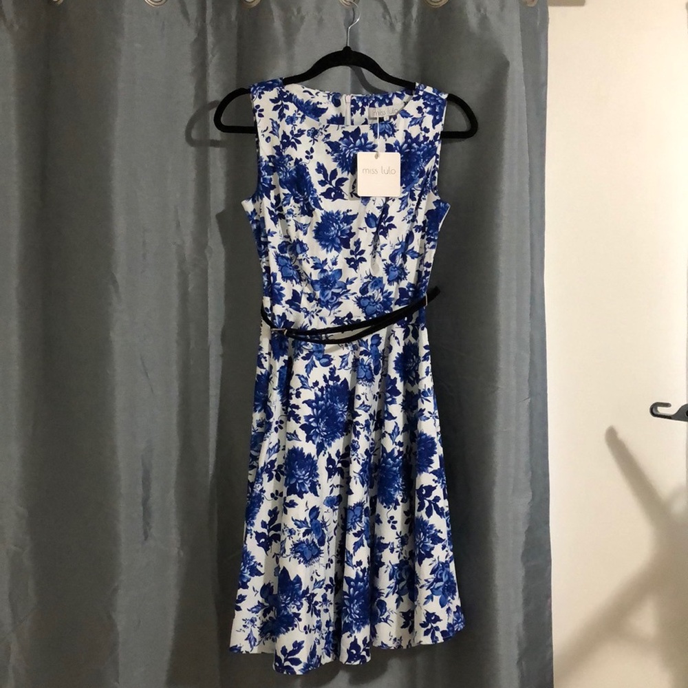 Beautiful white dress with blue flower design